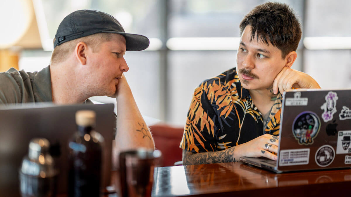 Two Jobylon employees deep in discussion